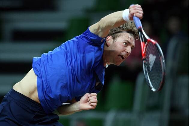 KAZAN, RUSSIA. MARCH 4, 2016. Sweden s Isak Arvidsson returns a ball in a Davis Cup Group I Europe Africa Zone 1st Round tennis match against Russia at Kazan Tennis Academy. Russia won 4-6, 6-1, 6-1, 6-4. Yegor Aleyev TASS  TS01891F