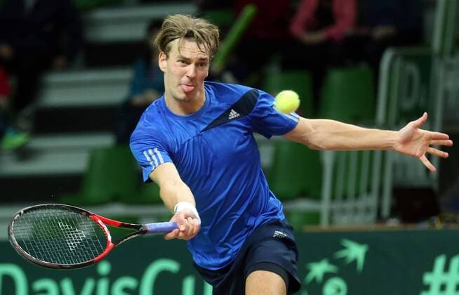 KAZAN, RUSSIA. MARCH 4, 2016. Sweden s Isak Arvidsson returns a ball in a Davis Cup Group I Europe Africa Zone 1st Round tennis match against Russia at Kazan Tennis Academy. Russia won 4-6, 6-1, 6-1, 6-4. Yegor Aleyev TASS  TS0188F1