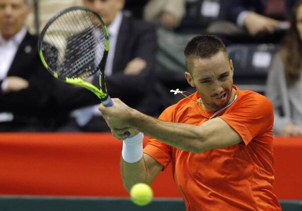 BELGRADE, March 4, 2016 -- Serbia s Viktor Troicki returns the ball to Kazakhstan s Mikhail Kukushkin during Davis Cup World Group 1st round match in Belgrade, Serbia, March 4, 2016. ) (SP)SERBIA-BELGRADE-TENNIS-DAVIS CUP-SERBIA VS KAZAKHSTAN PredragxMilosavljevic 
