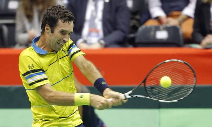 BELGRADE, March 4, 2016 -- Kazakhstan s Mikhail Kukushkin returns the ball to Serbia s Viktor Troicki during Davis Cup World Group 1st round match in Belgrade, Serbia, March 4, 2016. ) (SP)SERBIA-BELGRADE-TENNIS-DAVIS CUP-SERBIA VS KAZAKHSTAN PredragxMilosavljevic 