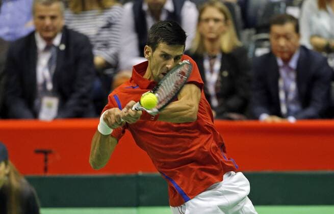(160305) -- Belgrade, March 5, 2016 -- Serbia s Novak Djokovic returns a shot to Kazakhstan s Aleksandr Nedovyesov during the Davis Cup World Group first round single match between Serbia and Kazakhstan in Belgrade, on March 4, 2016. Djokovic won 3-0. ) (SP)SERBIA-BELGRADE-TENNIS-DAVIS CUP-SERBIA VS KAZAKHSTAN PredragxMilosavljevic 