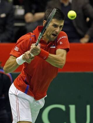(160305) -- Belgrade, March 5, 2016 -- Serbia s Novak Djokovic returns a shot to Kazakhstan s Aleksandr Nedovyesov during the Davis Cup World Group first round single match between Serbia and Kazakhstan in Belgrade, on March 4, 2016. Djokovic won 3-0. ) (SP)SERBIA-BELGRADE-TENNIS-DAVIS CUP-SERBIA VS KAZAKHSTAN PredragxMilosavljevic 