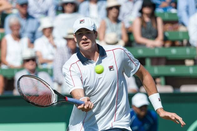 March 6, 2016: John Isner of USA in action against Bernard Tomic of Australia during the first reverse single match of the BNP Paribas Davis Cup World Group first round tie between Australia and USA at Kooyong tennis club in Melbourne, Australia. Tennis 2016: Davis Cup AUS v USA Day 3 - ZUMAc04_