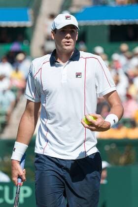 March 6, 2016: John Isner of USA in action against Bernard Tomic of Australia during the first reverse single match of the BNP Paribas Davis Cup World Group first round tie between Australia and USA at Kooyong tennis club in Melbourne, Australia. Tennis 2016: Davis Cup AUS v USA Day 3 - ZUMAc04_