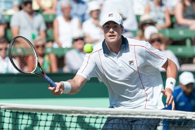 March 6, 2016: John Isner of USA in action against Bernard Tomic of Australia during the first reverse single match of the BNP Paribas Davis Cup World Group first round tie between Australia and USA at Kooyong tennis club in Melbourne, Australia. Tennis 2016: Davis Cup AUS v USA Day 3 - ZUMAc04_