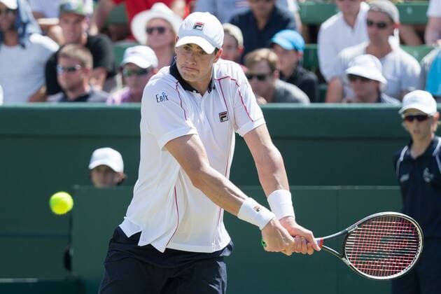 March 6, 2016: John Isner of USA in action against Bernard Tomic of Australia during the first reverse single match of the BNP Paribas Davis Cup World Group first round tie between Australia and USA at Kooyong tennis club in Melbourne, Australia. Tennis 2016: Davis Cup AUS v USA Day 3 - ZUMAc04_