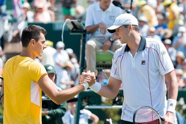 March 6, 2016: John Isner of USA shakes hands after winning the first reverse single match against Bernard Tomic of Australia at the BNP Paribas Davis Cup World Group first round tie between Australia and USA at Kooyong tennis club in Melbourne, Australia. USA won in 4 sets. Tennis 2016: Davis Cup AUS v USA Day 3 - ZUMAc04_