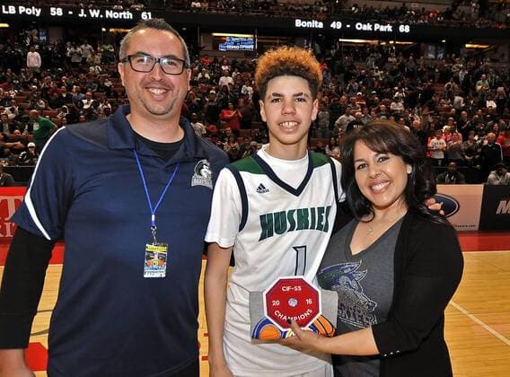 March 5, 2016 Anaheim, CA.Chino Hills guard LaMelo Ball 1 poses with the championship patch and school administrators after winning the CIF-SS Open division Final Boys Prep Basketball game between Chino Hills and Sierra Canyon at the Honda Center in Anaheim California..Chino Hills defeats Sierra Canyon 105-83. CA Prep Basketball 2016: Boys Open Division Southern Section Championship Chino Hills vs Sierra Canyon MAR 05 - ZUMAcl1_