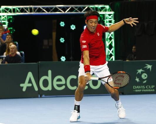 06.03.2016. Barclaycard Arena, Birmingham, England. Davis Cup Tennis World Group First Round. Great Britain versus Japan. Japan s Kei Nishikori hits a backhand during his singles match against Great Britain s Andy Murray on day 3 of the tie. xAlanxMartinx  ActionPlus11715064