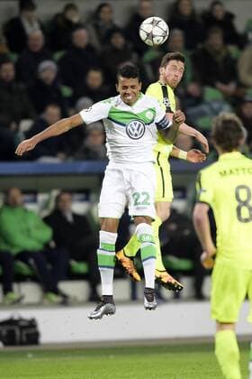 Gent s Gustav Wikheim and Gent s Brecht Dejaegere fight for the ball during a soccer game between German team VfL Wolfsburg and Belgian club KAA Gent, the return game of the 1 8 final s of the UEFA Champions League competition, Tuesday 08 March 2016 in Wolfsburg, Germany. Wolfsburg won the first leg 2-3. YORICKxJANSENS  x04807148x