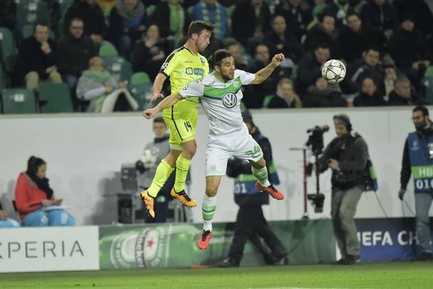 Dejaegere Brecht midfielder of KAA Gent jumping towards the ball with Ricardo Rodriguez defender of VfL Wolfsburg during the Champions League Round of 16, second leg match between VfL Wolfsburg and KAA Gent at the Volkswagen Arena in Wolfsburg, Germany. FOOTBALL : Wolfsbourg vs La gantoise - Ligue des Champions - 08 03 2016 PHOTONEWS PANORAMIC 