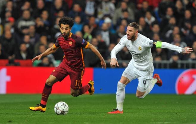 Mohamed Salah and Sergio Ramos (Real Madrid) compete for the ball during the UEFA Champions League Group A match between Real Madrid and AS Roma played at Estadio Santiago Bernabeu, Madrid - FOTO : J.M.Colomo  xJ.M.Colomox xx