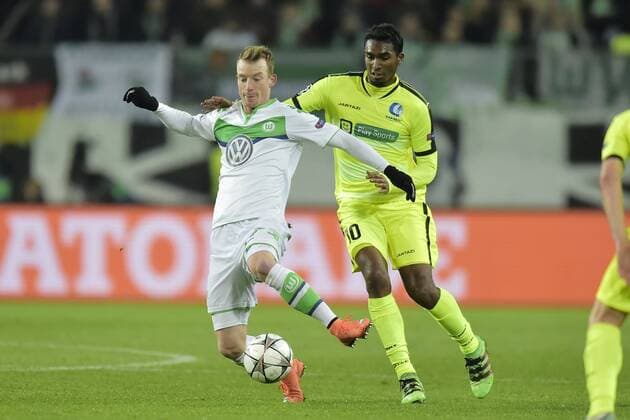 Maximilian Arnold midfielder of VfL Wolfsburg is challenged by Neto Renato Cardoso midfielder of KAA Gent during the Champions League Round of 16, second leg match between VfL Wolfsburg and KAA Gent at the Volkswagen Arena in Wolfsburg, Germany. FOOTBALL : Wolfsbourg vs La gantoise - Ligue des Champions - 08 03 2016 PHOTONEWS PANORAMIC 