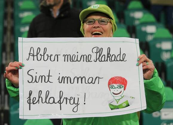 Fan mit Plakat