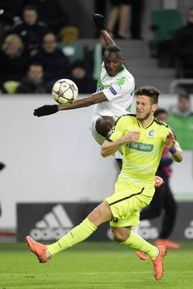 Wolfsburg s Josuha Guilavogui and Gent s Rami Gershon fight for the ball during a soccer game between German team VfL Wolfsburg and Belgian club KAA Gent, the return game of the 1 8 final s of the UEFA Champions League competition, Tuesday 08 March 2016 in Wolfsburg, Germany. Wolfsburg won the first leg 2-3. YORICKxJANSENS  x04807331x