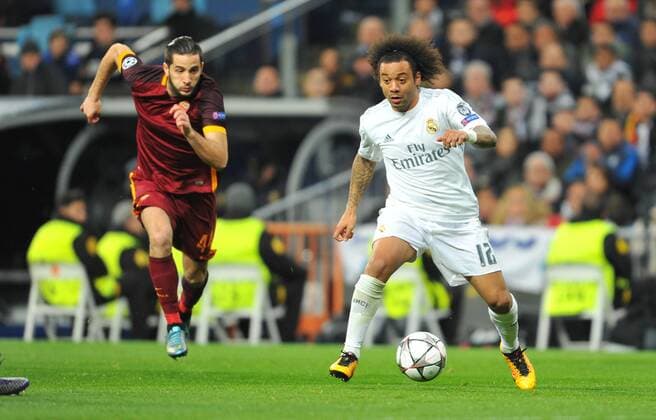 Marcelo (Real Madrid) and Kostas Manolas (AS Roma) in action during the UEFA Champions League Group A match between Real Madrid and AS Roma played at Estadio Santiago Bernabeu, Madrid - FOTO : J.M.Colomo  xJ.M.Colomox xx