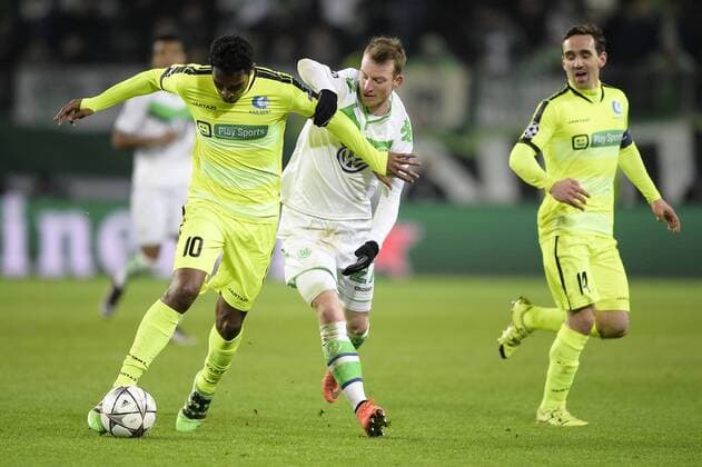 Gent s Renato Neto and Wolfsburg s Maximilian Arnold fight for the ball during a soccer game between German team VfL Wolfsburg and Belgian club KAA Gent, the return game of the 1 8 final s of the UEFA Champions League competition, Tuesday 08 March 2016 in Wolfsburg, Germany. Wolfsburg won the first leg 2-3. YORICKxJANSENS  x04807342x