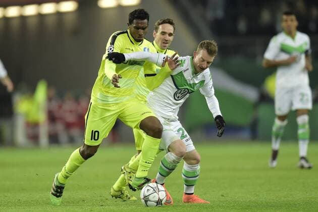 Neto Renato Cardoso midfielder of KAA Gent is challenged by Maximilian Arnold midfielder of VfL Wolfsburg during the Champions League Round of 16, second leg match between VfL Wolfsburg and KAA Gent at the Volkswagen Arena in Wolfsburg, Germany. FOOTBALL : Wolfsbourg vs La gantoise - Ligue des Champions - 08 03 2016 PHOTONEWS PANORAMIC 