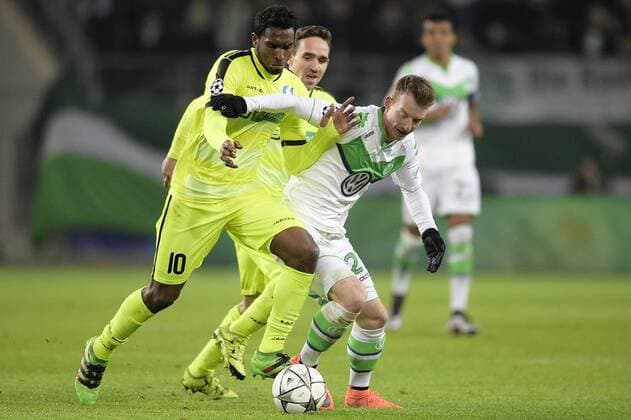 Gent s Renato Neto and Wolfsburg s Maximilian Arnold fight for the ball during a soccer game between German team VfL Wolfsburg and Belgian club KAA Gent, the return game of the 1 8 final s of the UEFA Champions League competition, Tuesday 08 March 2016 in Wolfsburg, Germany. Wolfsburg won the first leg 2-3. YORICKxJANSENS  x04807348x