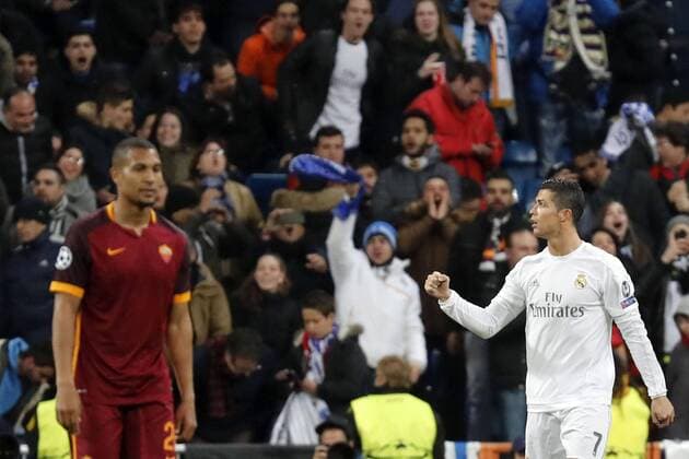 Real Madrid Portuguese forward Cristiano Ronaldo (R) celebrates the first goal before Roma during the Champions League round 16 match held at Santiago Bernabeu stadium in Madrid, Spain, 8 March 2016. REAL MADRID VS ROMA !ACHTUNG: NUR REDAKTIONELLE NUTZUNG!  GRA423 20160308-635930731861629061