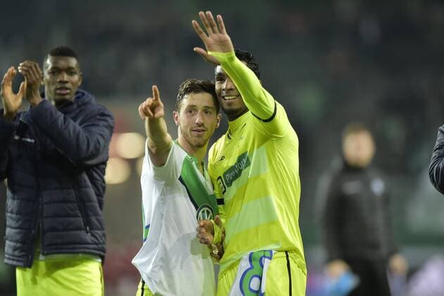 Dejaegere Brecht midfielder of KAA Gent and Neto Renato Cardoso midfielder of KAA Gent greeting the fans despite the defeat after the Champions League Round of 16, second leg match between VfL Wolfsburg and KAA Gent at the Volkswagen Arena in Wolfsburg, Germany. FOOTBALL : Wolfsbourg vs La gantoise - Ligue des Champions - 08 03 2016 PHOTONEWS PANORAMIC 