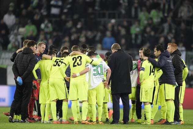 Gent s players and Gent s head coach Hein Vanhaezebrouck pictured after a soccer game between German team VfL Wolfsburg and Belgian club KAA Gent, the return game of the 1 8 final s of the UEFA Champions League competition, Tuesday 08 March 2016 in Wolfsburg, Germany. Wolfsburg won the first leg 2-3. YORICKxJANSENS  x04807446x