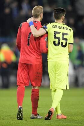 Gent s goalkeeper Matz Sels and Gent s Rami Gershon pictured after a soccer game between German team VfL Wolfsburg and Belgian club KAA Gent, the return game of the 1 8 final s of the UEFA Champions League competition, Tuesday 08 March 2016 in Wolfsburg, Germany. Wolfsburg won the first leg 2-3. YORICKxJANSENS  x04807430x