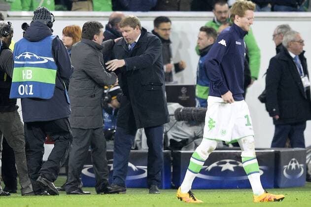 Wolfsburg s head coach Dieter Hecking and Gent s head coach Hein Vanhaezebrouck pictured after a soccer game between German team VfL Wolfsburg and Belgian club KAA Gent, the return game of the 1 8 final s of the UEFA Champions League competition, Tuesday 08 March 2016 in Wolfsburg, Germany. Wolfsburg won the first leg 2-3. YORICKxJANSENS  x04807432x