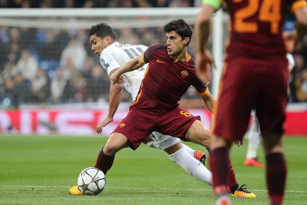 08 03.2016 UEFA Champions League Estadio Santiago Bernabeu Real Madrid CF v AS Roma Diego Perotti of AS Roma (right) and Casemiro of Real Madrid (left) during the UEFA Champions League last 16 second leg match in Madrid between Real Madrid and Roma at the Estadio Santiago Bernabeu in Madrid, Spain. UEFA Champions League - Real Madrid v Roma UCL_RM_Rma