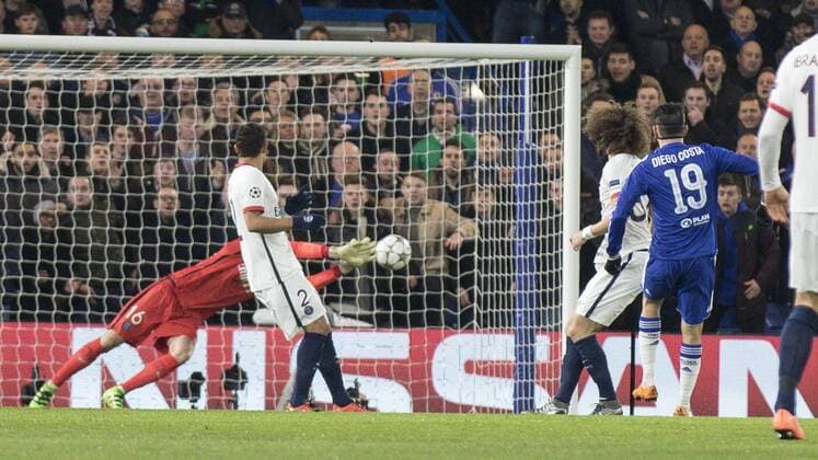 Football - 2015 2016 Champions League - Round of 16, Second Leg: Chelsea 1 vs. Paris Saint-Germain 2 Chelsea s Diego Costa forces an early save from Kevin Trapp of PSG at Stamford Bridge. COLORSPORT DANIEL BEARHAM  che_psg