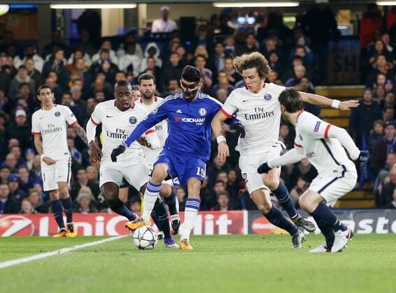 Chelsea s Diego Costa finds himself surrounded by PSG s Blaise Matuidi and David Luiz - UEFA Champions League - Chelsea vs Paris Saint Germain - Stamford Bridge - London - England - 9th March 2016 - Pic David Klein Sportimage EDITORIAL USE ONLY. No use with unauthorised audio, video, data, fixture lists, club league logos or live services. Online in-match use limited to 120 images, no video emulation. No use in betting, games or single club league player publications.