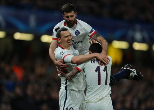 09.03.2016. Stamford Bridge, London, England. Champions League. Chelsea versus Paris Saint Germain. Paris St. Germain Forward Zlatan Ibrahimovic ;, & xc1;ngel Di Maria and Thiago Motta celebrate Adrien Rabiot s goal, 1-0 Paris St. Germain xMarkxKertonx  ActionPlus11715911