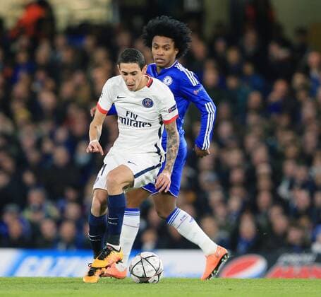 Chelsea s Willian tussles with PSG s Angel Di Maria - UEFA Champions League - Chelsea vs Paris Saint Germain - Stamford Bridge - London - England - 9th March 2016 - Pic David Klein Sportimage EDITORIAL USE ONLY. No use with unauthorised audio, video, data, fixture lists, club league logos or live services. Online in-match use limited to 120 images, no video emulation. No use in betting, games or single club league player publications.