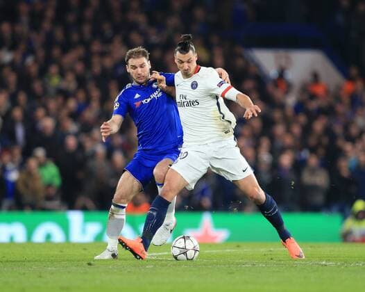 Chelsea s Branislav Ivanovic tussle with PGS s Zlatan Ibrahimovic - UEFA Champions League - Chelsea vs Paris Saint Germain - Stamford Bridge - London - England - 9th March 2016 - Pic David Klein Sportimage EDITORIAL USE ONLY. No use with unauthorised audio, video, data, fixture lists, club league logos or live services. Online in-match use limited to 120 images, no video emulation. No use in betting, games or single club league player publications.