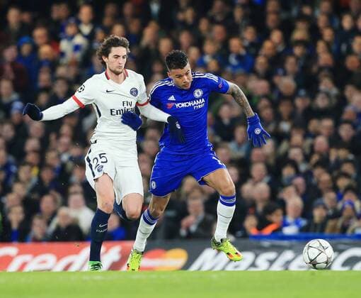 Chelsea s Kennedy tussles with PSG s Adrien Rabiot - UEFA Champions League - Chelsea vs Paris Saint Germain - Stamford Bridge - London - England - 9th March 2016 - Pic David Klein Sportimage EDITORIAL USE ONLY. No use with unauthorised audio, video, data, fixture lists, club league logos or live services. Online in-match use limited to 120 images, no video emulation. No use in betting, games or single club league player publications.