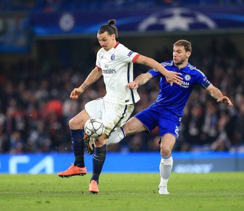 Chelsea s Bratislav Ivanovic tussles with PGS s Zlatan Ibrahimovic - UEFA Champions League - Chelsea vs Paris Saint Germain - Stamford Bridge - London - England - 9th March 2016 - Pic David Klein Sportimage EDITORIAL USE ONLY. No use with unauthorised audio, video, data, fixture lists, club league logos or live services. Online in-match use limited to 120 images, no video emulation. No use in betting, games or single club league player publications.