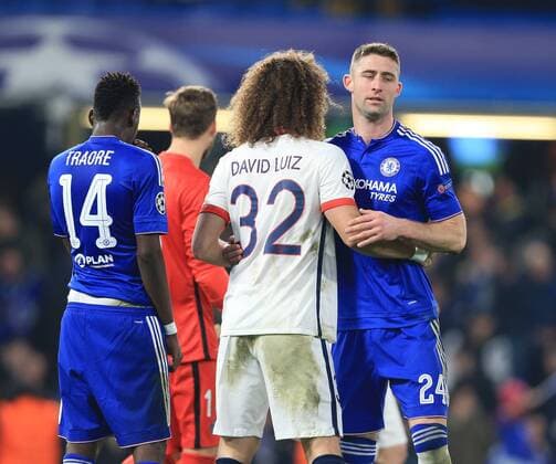 Chelsea s Gary Cahill hugs PSG s David Luiz at the final whistle - UEFA Champions League - Chelsea vs Paris Saint Germain - Stamford Bridge - London - England - 9th March 2016 - Pic David Klein Sportimage EDITORIAL USE ONLY. No use with unauthorised audio, video, data, fixture lists, club league logos or live services. Online in-match use limited to 120 images, no video emulation. No use in betting, games or single club league player publications.