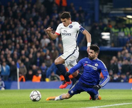 Chelsea s Diego Costa gets injured under the challenge of PSG s Thiago Silva - UEFA Champions League - Chelsea vs Paris Saint Germain - Stamford Bridge - London - England - 9th March 2016 - Pic David Klein Sportimage EDITORIAL USE ONLY. No use with unauthorised audio, video, data, fixture lists, club league logos or live services. Online in-match use limited to 120 images, no video emulation. No use in betting, games or single club league player publications.