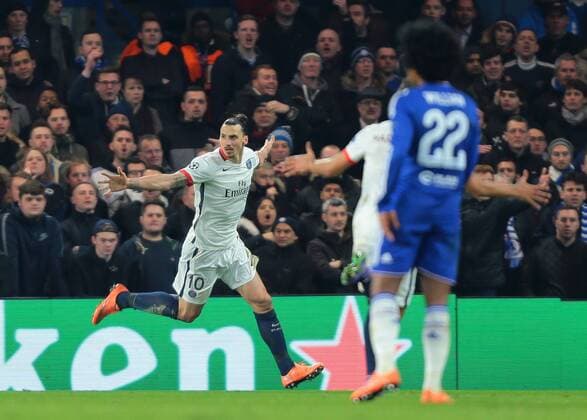 09.03.2016. Stamford Bridge, London, England. Champions League. Chelsea versus Paris Saint Germain. Paris St. Germain Forward Zlatan Ibrahimovic; celebrates his goal with Paris St. Germain Defender Marquinhos, 2-1 PSG, as Chelsea Midfielder Willian looks dejected xMarkxKertonx  ActionPlus11715989