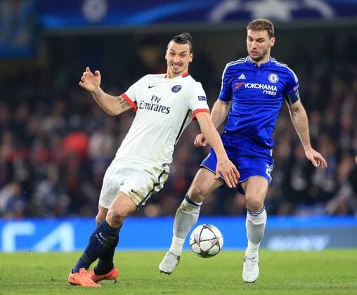 Chelsea s Bratislava Ivanovic tussles with PSG s Zlatan Ibrahimovic - UEFA Champions League - Chelsea vs Paris Saint Germain - Stamford Bridge - London - England - 9th March 2016 - Pic David Klein Sportimage EDITORIAL USE ONLY. No use with unauthorised audio, video, data, fixture lists, club league logos or live services. Online in-match use limited to 120 images, no video emulation. No use in betting, games or single club league player publications.