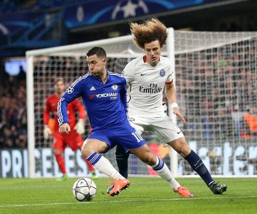 Chelsea s Eden Hazard tussles with PSG s David Luiz - UEFA Champions League - Chelsea vs Paris Saint Germain - Stamford Bridge - London - England - 9th March 2016 - Pic David Klein Sportimage EDITORIAL USE ONLY. No use with unauthorised audio, video, data, fixture lists, club league logos or live services. Online in-match use limited to 120 images, no video emulation. No use in betting, games or single club league player publications.