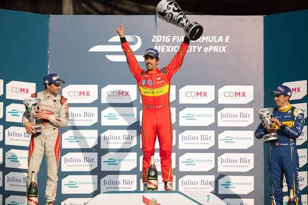 MEXICO CITY, March 12, 2016 -- Brazil s driver Lucas Di Grassi (C) of ABT Schaeffler Audi Team celebrates during the award ceremony accompanied by Belgium s Jerome D ambrosio (L) of Dragon Racing Team and Swiss Sebastien Buemi of Renault e.Dams Team at the end of FIA Formula E Championship Mexico City ePrix at Autodromo Hermanos Rodriguez, in Mexico City, capital of Mexico, on March 12, 2016. ) (jp) (fnc) (SP)MEXICO-MEXICO CITY motor racing Motorsport FORMULA E PedroxMera 
