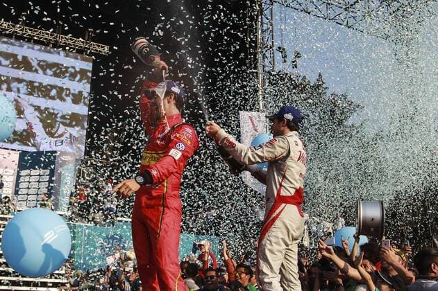 ATTENTION EDITORS, CORRECTS BYLINE Brazilian Formula E driver Lucas di Grassi (L), ABT Schaeffler Audi celebrates after winning the 5th stage of the Formula E Championship held at the Hermanos Rodriguez circuit in Mexico City, Mexico, on 12 March 2016. FORMULA E !ACHTUNG: NUR REDAKTIONELLE NUTZUNG!  20160313-635934582602779454