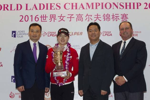 South Korea s Lee Jung-min, second left, poses with her champion trophy after winning the World Ladies Championship at Mission Hills Golf Club in Shenzhen city, south China s Guangdong province, 13 March 2016. Lee Jung-min won the World Ladies Championship on Sunday (13 March 2016), beating fellow South Korean players Lee Seung-hyun, Kim Bo-kyung and Ji Han-sol in rainy conditions at Mission Hills. Lee Jung-min closed with a 6-under 66 for a 9-under 279 total on the Olazabal Course in the event sanctioned by the European, Korean and Chinese tours. Lee Jung-Min also won the team competition with Ko Jin-Young at 12 under. South Korea s Lee Jung-min wins World Ladies Championship  pbu414944_07