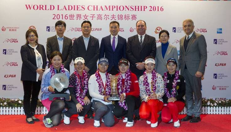 South Korea s Lee Jung-min, front third right, and Ko Jin-young, front third left, pose with their trophy next to other golfers and officials after winning the team competition of the World Ladies Championship at Mission Hills Golf Club in Shenzhen city, south China s Guangdong province, 13 March 2016. Lee Jung-min won the World Ladies Championship on Sunday (13 March 2016), beating fellow South Korean players Lee Seung-hyun, Kim Bo-kyung and Ji Han-sol in rainy conditions at Mission Hills. Lee Jung-min closed with a 6-under 66 for a 9-under 279 total on the Olazabal Course in the event sanctioned by the European, Korean and Chinese tours. Lee Jung-Min also won the team competition with Ko Jin-Young at 12 under. South Korea s Lee Jung-min wins World Ladies Championship  pbu414944_11