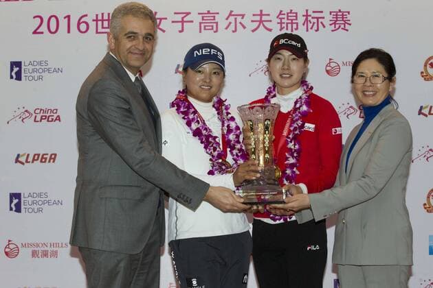 South Korea s Lee Jung-min, second right, and Ko Jin-young, second left, pose with their trophy after winning the team competition of the World Ladies Championship at Mission Hills Golf Club in Shenzhen city, south China s Guangdong province, 13 March 2016. Lee Jung-min won the World Ladies Championship on Sunday (13 March 2016), beating fellow South Korean players Lee Seung-hyun, Kim Bo-kyung and Ji Han-sol in rainy conditions at Mission Hills. Lee Jung-min closed with a 6-under 66 for a 9-under 279 total on the Olazabal Course in the event sanctioned by the European, Korean and Chinese tours. Lee Jung-Min also won the team competition with Ko Jin-Young at 12 under. South Korea s Lee Jung-min wins World Ladies Championship  pbu414944_15
