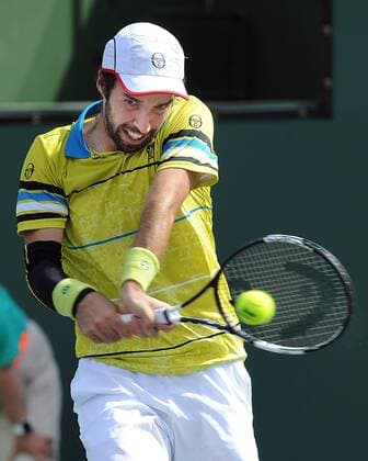 March 13, 2016: Mikhail Kukushkin (KAZ) hits a backhand shot during a match against Kei Nishikori (JPN) during the BNP Paribas Open played at the Indian Wells Tennis Garden in Indian Wells, CA. (Photo By John Cordes Icon Sportswire) TENNIS: MAR 13 BNP Paribas Open Icon506160313128 EDITORIAL USE ONLY