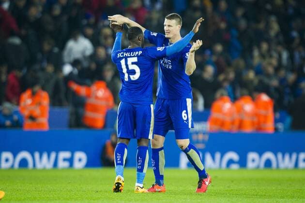 14.03.2016. King Power Stadium, Leicester, England. Barclays Premier League. Leicester versus Newcastle United. Jeff Schlupp and Robert Huth of Leicester City celebrate their win after the final whistle. xGrahamxWilsonx  ActionPlus11718306