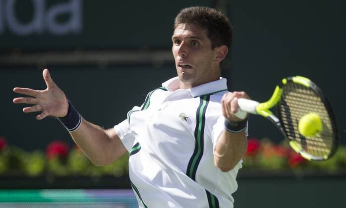 Federico Delbonis of Argentina hits a return during his third round men s singles against Andy Murray of Britain at the BNP Paribas Open in Indian Wells, the United States, on March 14, 2016. Federico Delbonis won 2-1. Yang Lei) (SP)U.S.-INDIAN WELLS-TENNIS-BNP PARIBAS OPEN YangxLeixC 