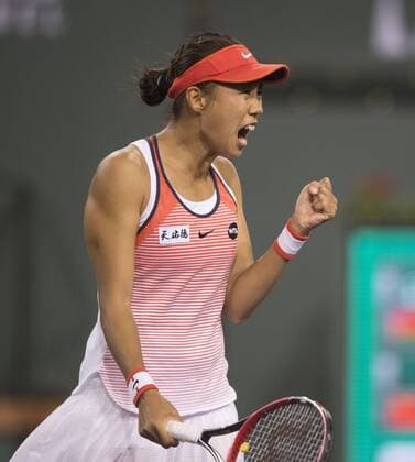 Zhang Shuai of China celebrates during the women s singles 3rd round match against Victoria Azarenka of Belarus at the BNP Paribas Open in Indian Wells, California, the United States on March 14, 2016. Yang Lei) (SP)US-INDIAN WELLS-TENNIS-BNP PARIBAS OPEN YangxLeixc 